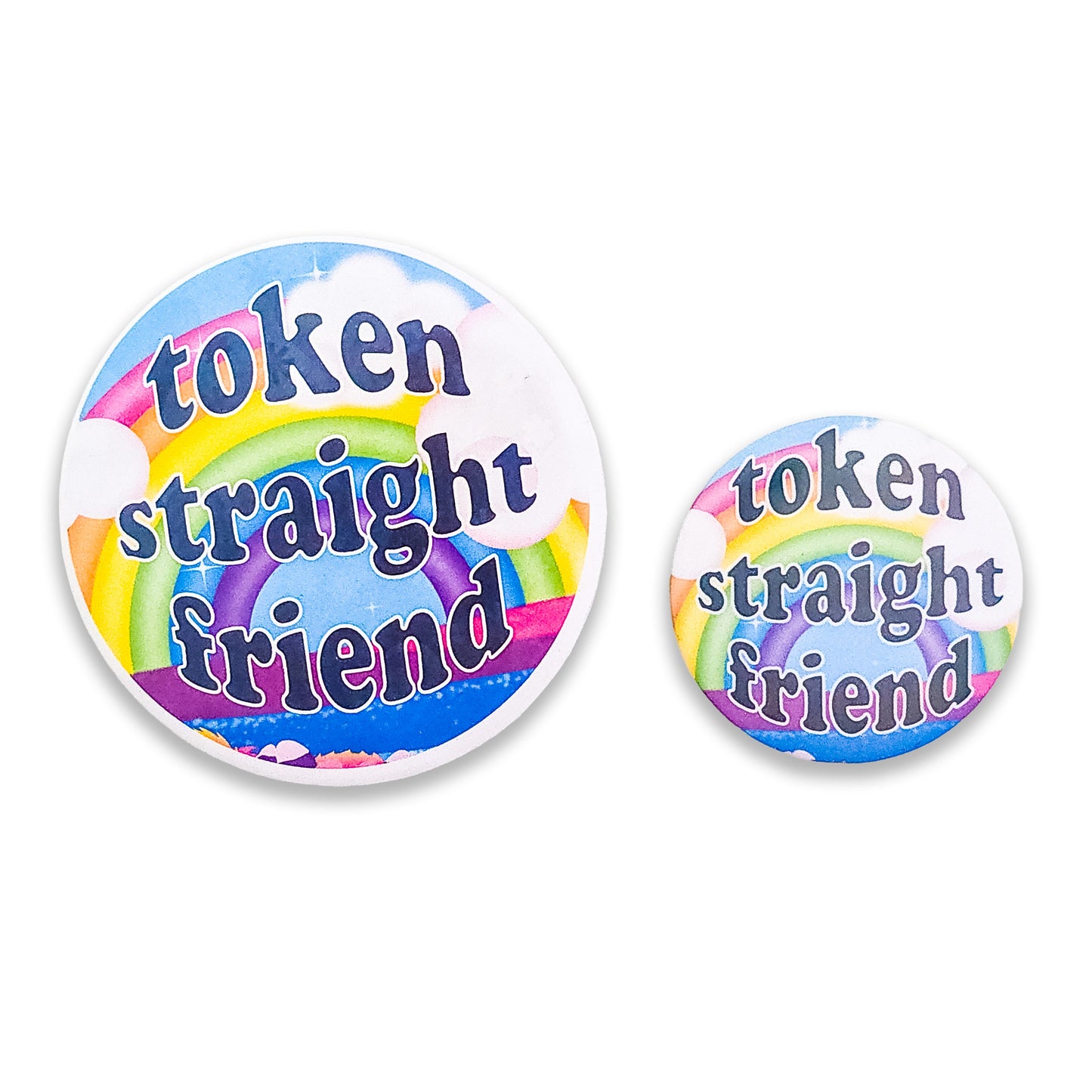 close-up view of big and small colorful 'Token Straight Friend' holographic pin featuring a bold rainbow design and playful text, perfect for pride events and allyship.