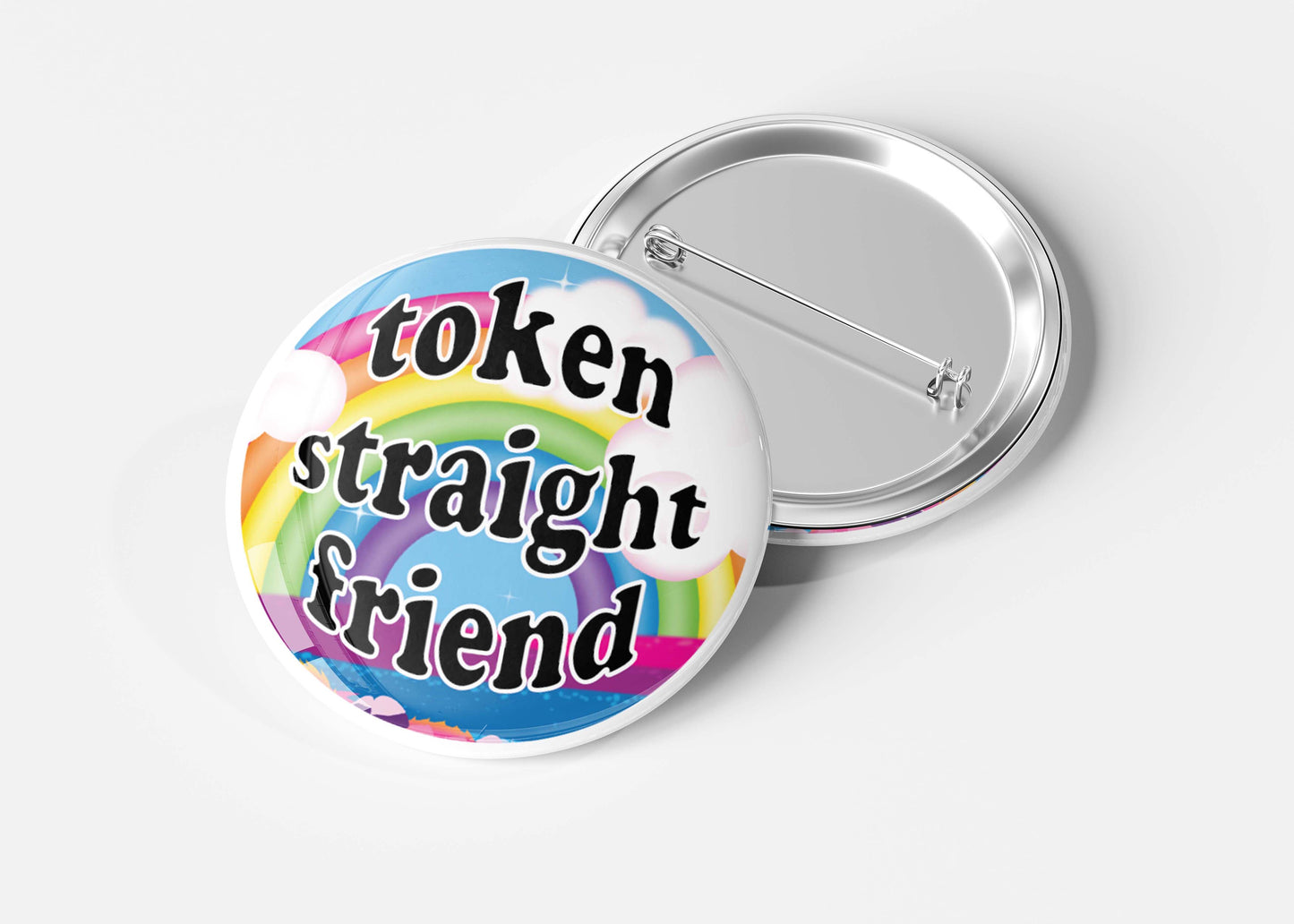 close-up view of a colorful 'Token Straight Friend' holographic pin & backpin button featuring a bold rainbow design and playful text, perfect for pride events and allyship.